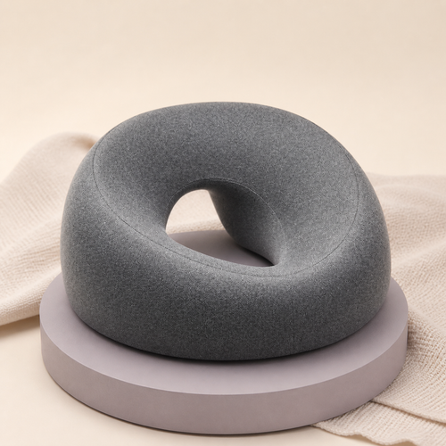 DayHush ProneRest Pillow on a warm cream and lavender studio set